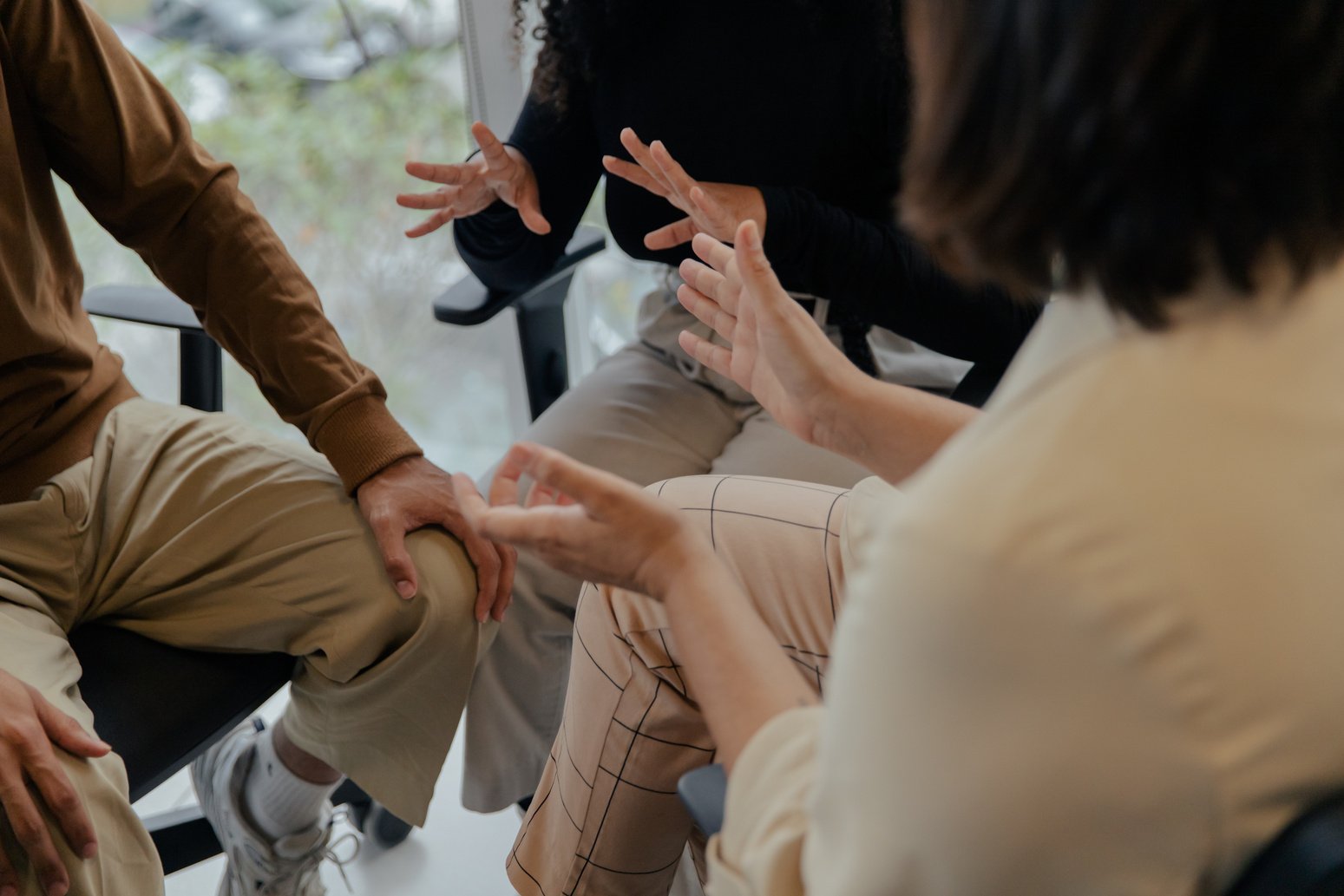 Team of Business Colleagues Collaborating Ideas in a Meeting